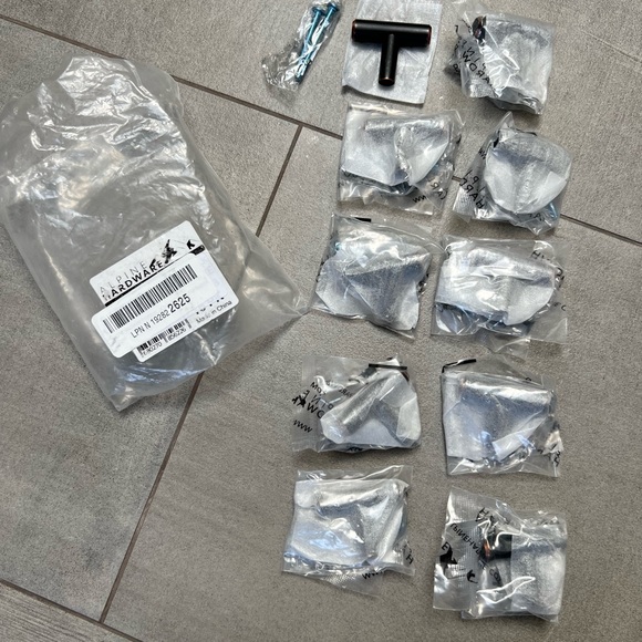 NIB cabinet hardware in rubbed bronze finish! Set of 10 - each measures 2” long - Picture 2 of 7